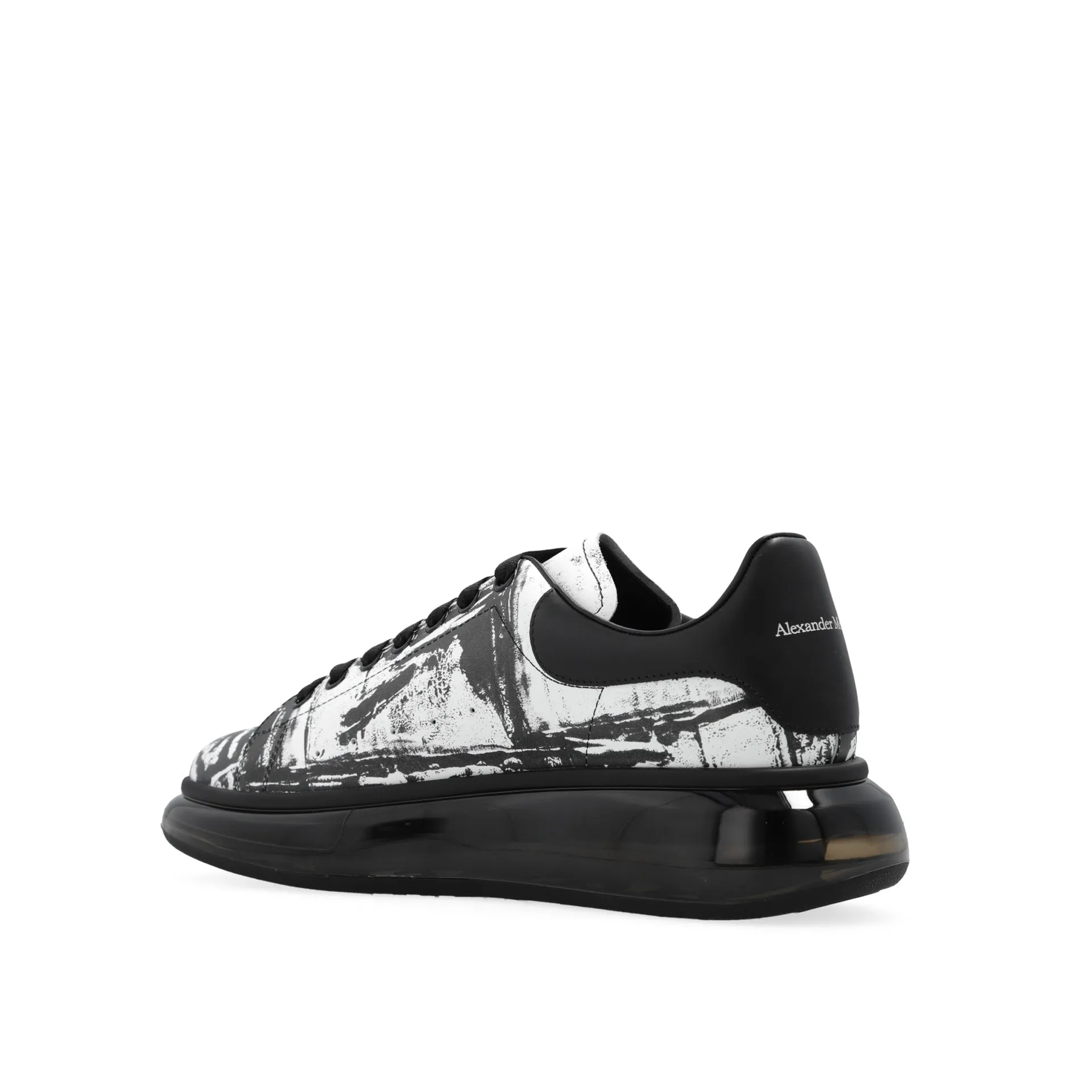 Sure! Heres an optimized title for the Alexander McQueen sneakers:

**Alexander McQueen Larry Oversized Sneakers for Men - Stylish Designer Footwear**